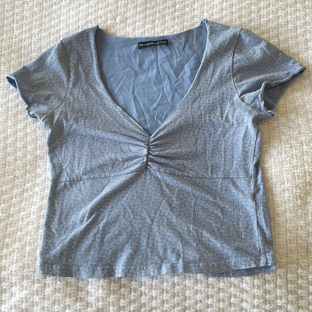 Brandy Melville Gina top in blue with tiny white flowers